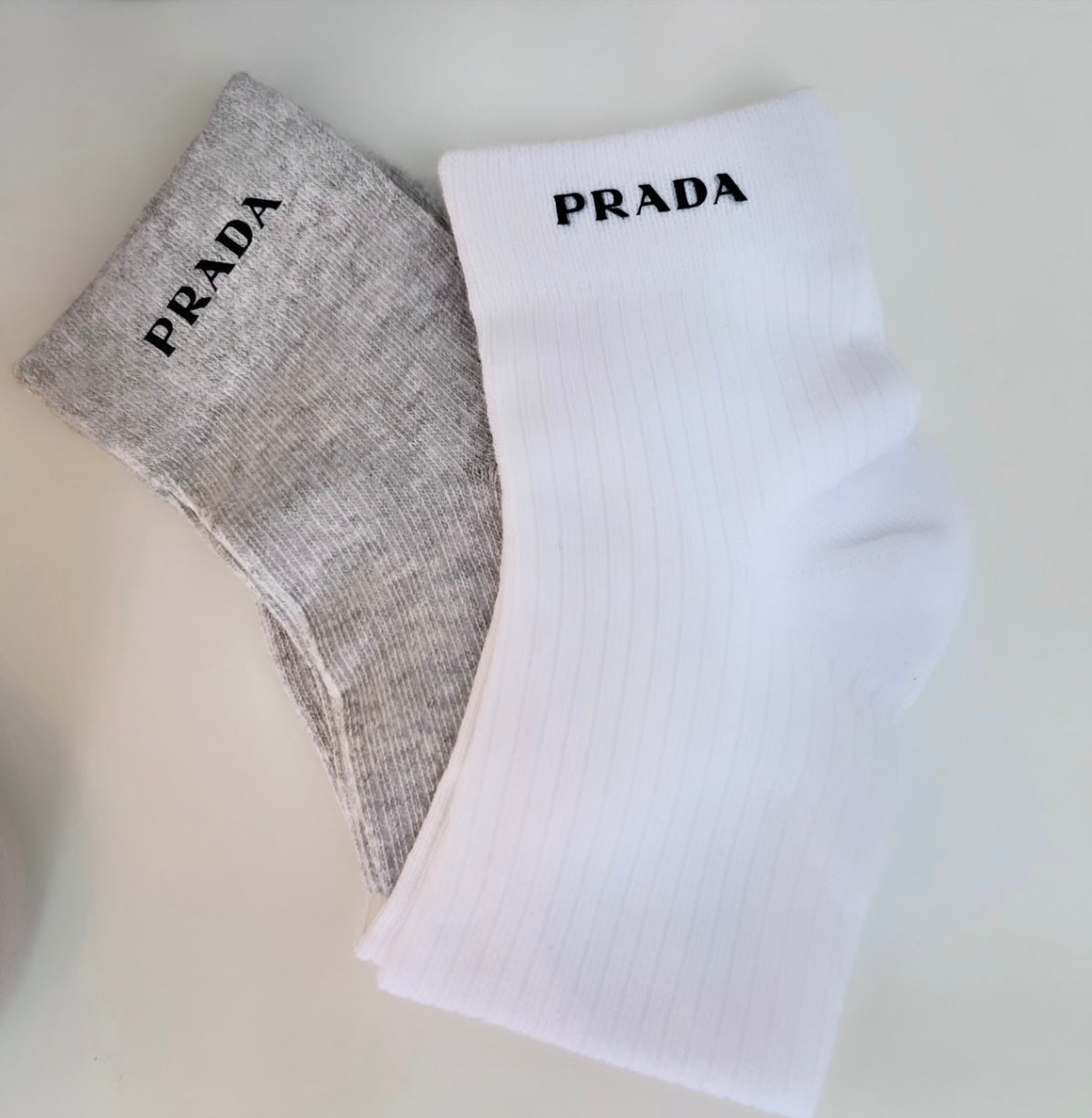 P R D A White Socks